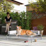 Lettino per Cani Rialzato di 20 cm con Cuscino a L, in Poliestere e Acciaio, 110x75x30 cm, Grigio e Argento - immagine 9